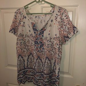 Beige top with blue and orange print